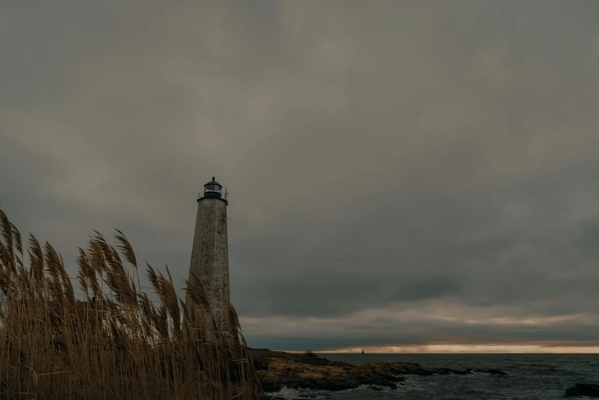 White and brown lighthouse at Lighthouse Point in New Haven, Connecticut