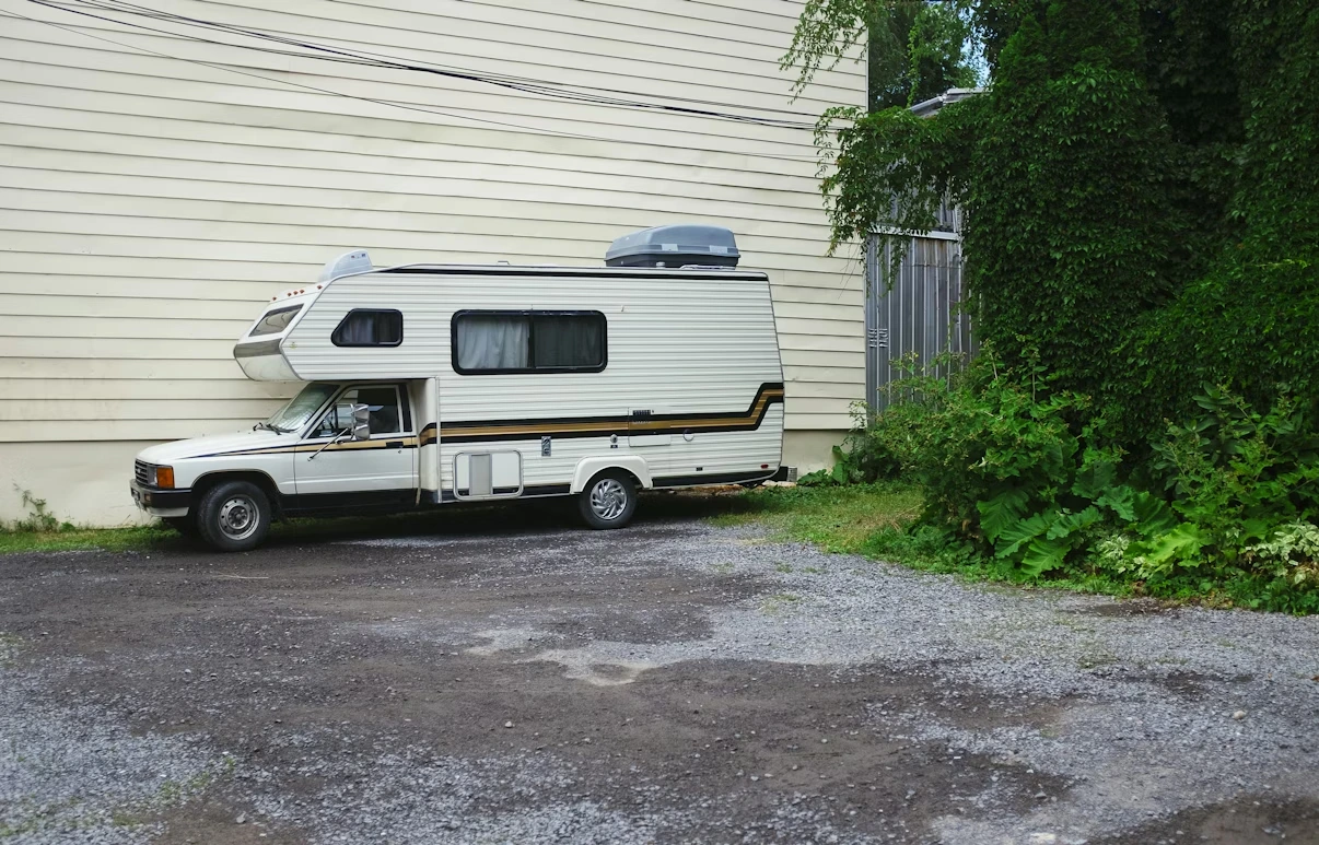White and brown vintage RV