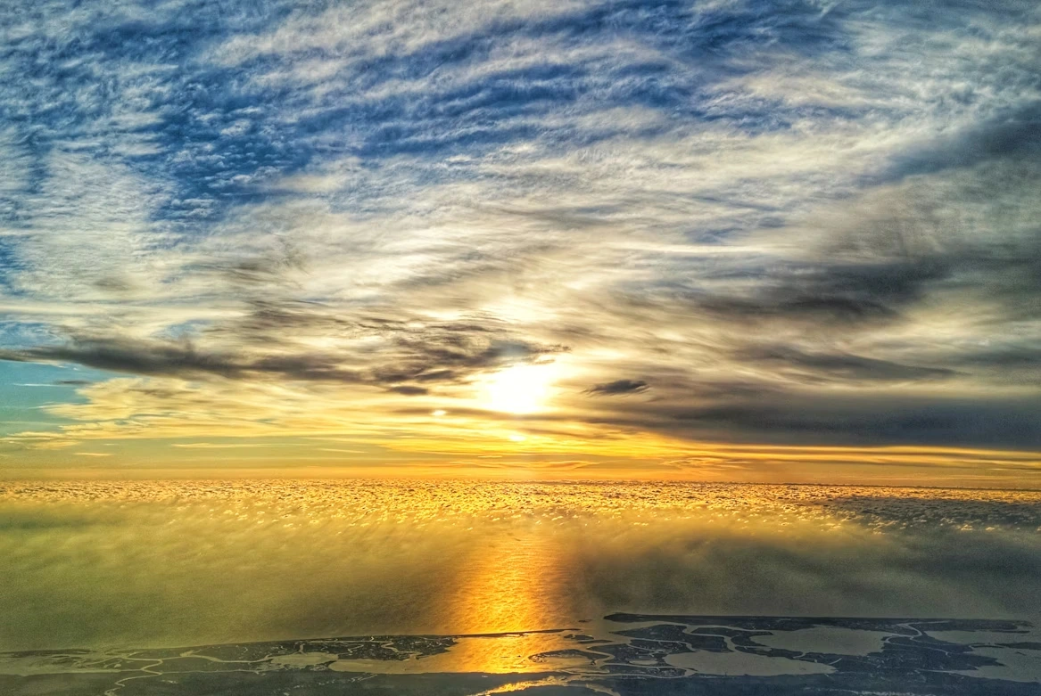 White clouds over the water during daytime in Chesapeake, Virginia
